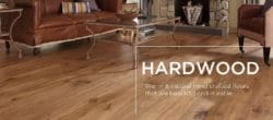 A modern living room with warm Hardwood Flooring